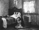 Aurore at her mother's bedside