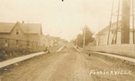 Main Street of Ste. Philomne de Fortierville, with the Water Tower on the Right