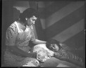 Marie-Louise at Aurore's bedside