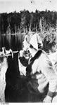 Tom Thomson, a member of the Group of Seven, shaving after coming out of the woods with a beard